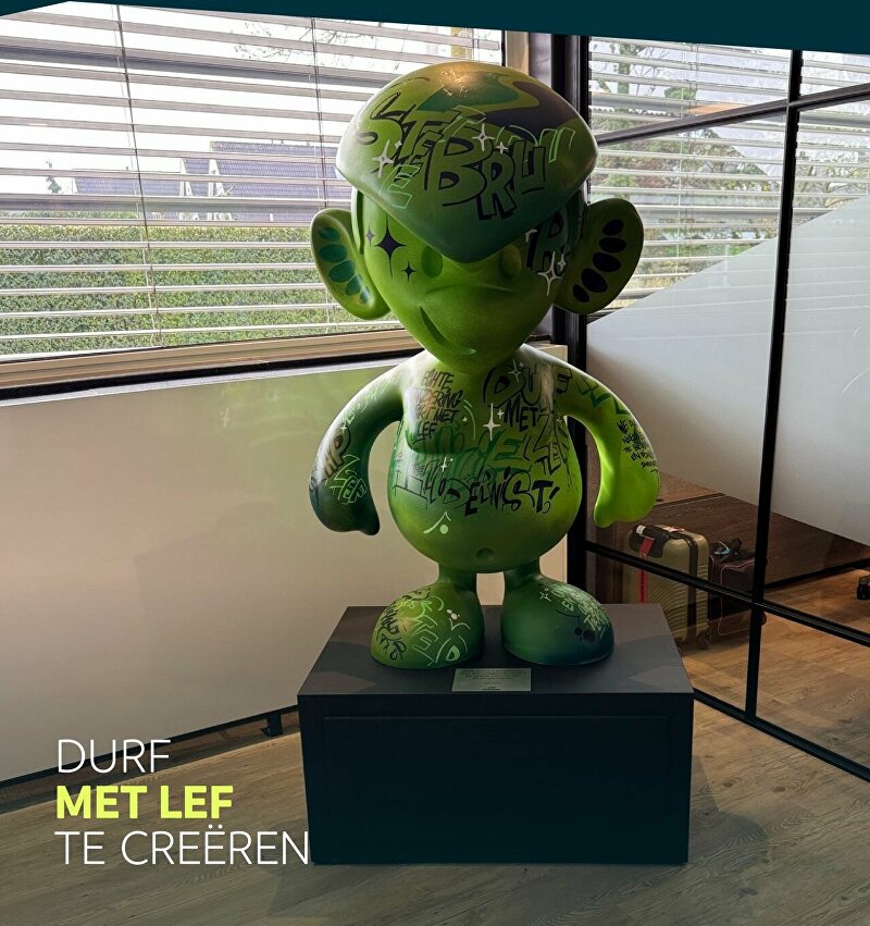 Stebru 20th anniversary, Stebru jubilee celebration, family business anniversary Netherlands, corporate winter trip, company ski trip, team building winter sports, Ginvi custom art, custom wine cooler design, graffiti wine cooler, graffiti artist Timo, custom graffiti artwork, branded corporate gifts, Binkie XL sculpture, custom sculpture graffiti, office lobby statement piece, corporate celebration ideas, employee appreciation gift, company milestone celebration, creative corporate branding, unique company event ideas